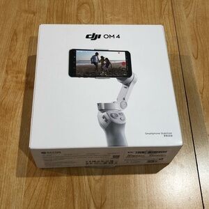 New Opened DJI OM 4 Smartphone Stabilizer in Gray